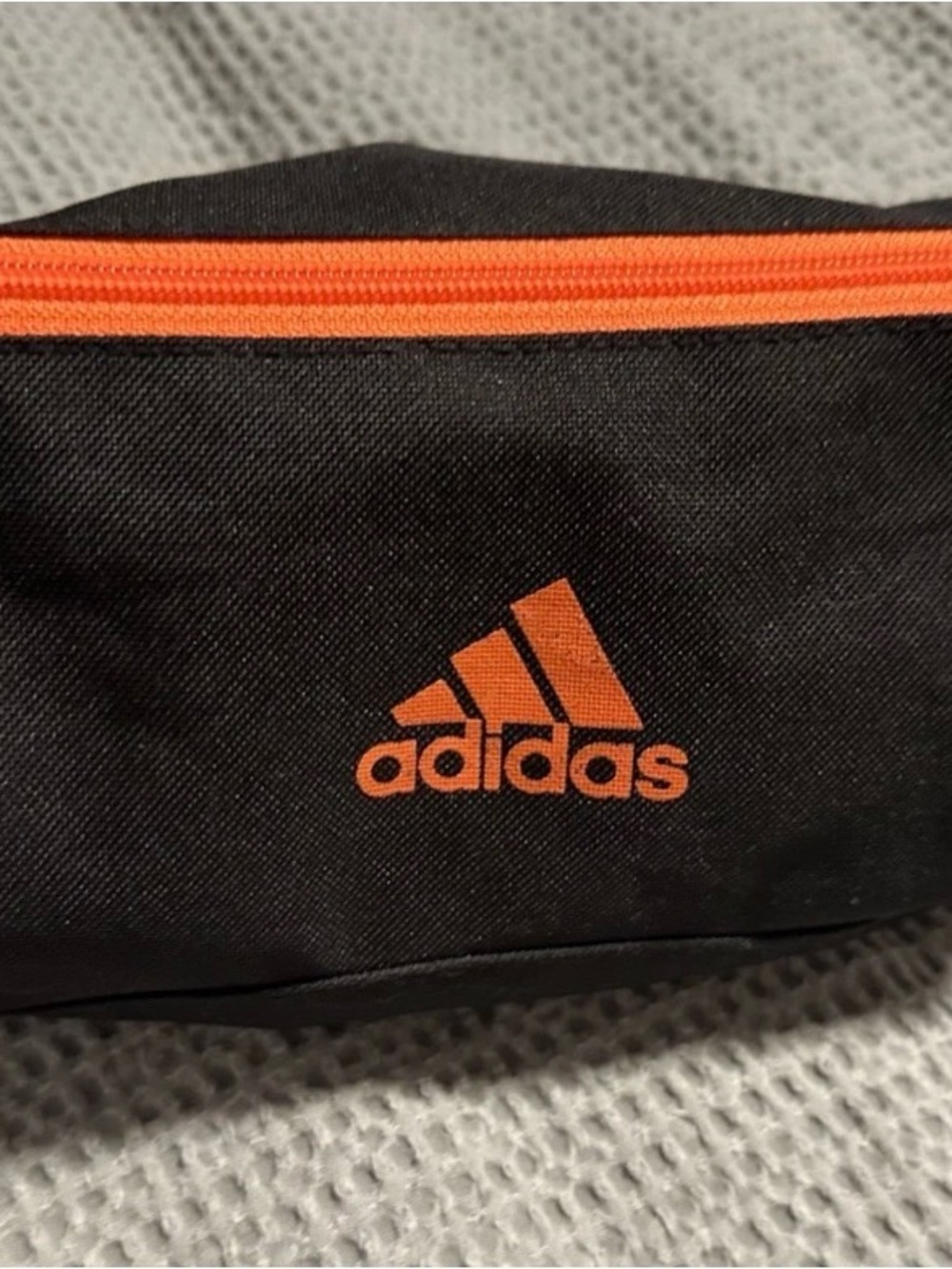 adidas Men's Black and Orange zip travel bag